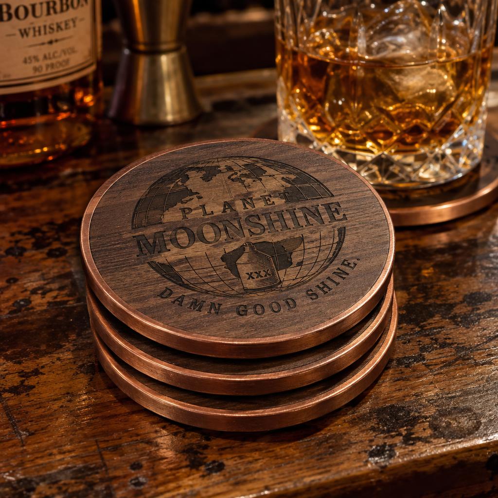 Set of Planet Moonshine walnut and copper coasters